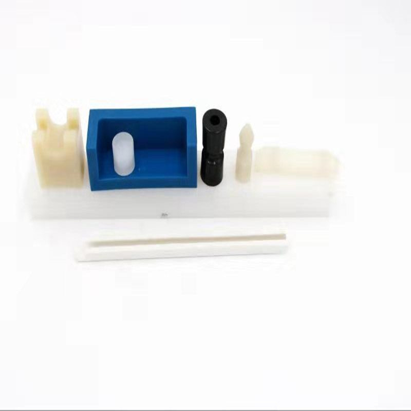 Traitement personnalisé POM PP PVC ABS PTFE FEP PVDF PA66 UHMWPE bloc coulissant fixe en plastique d'ingénierie en Nylon